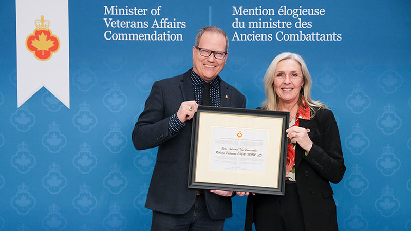 Minister of Veterans Affairs Darren Fisher (left) and Rebecca Patterson (right).