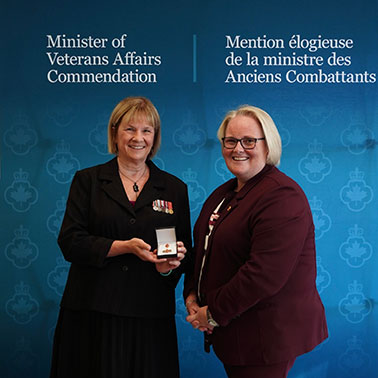Karen Breeck (left) and Minister of Veterans Affairs Jill McKnight (right).