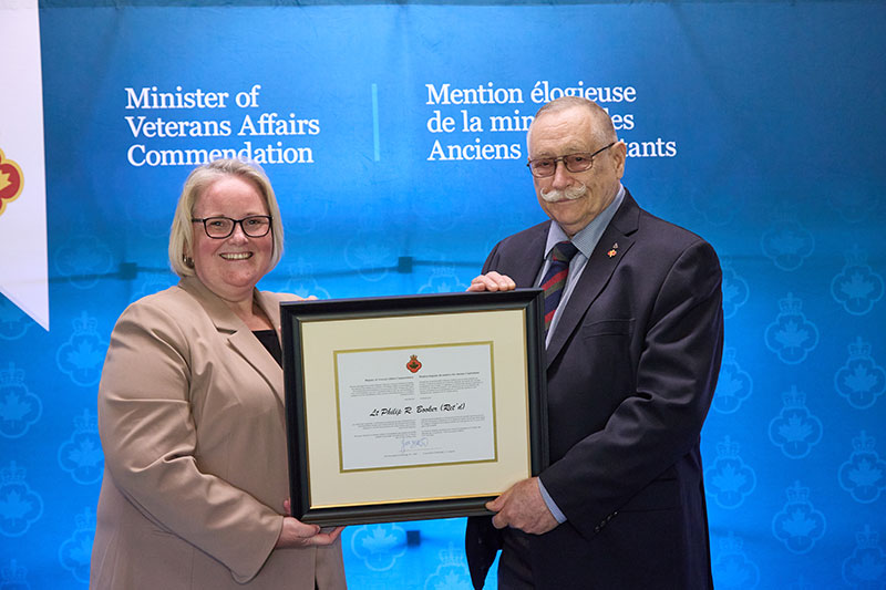 Minister of Veterans Affairs Jill McKnight (left) and Philip Booker (right).