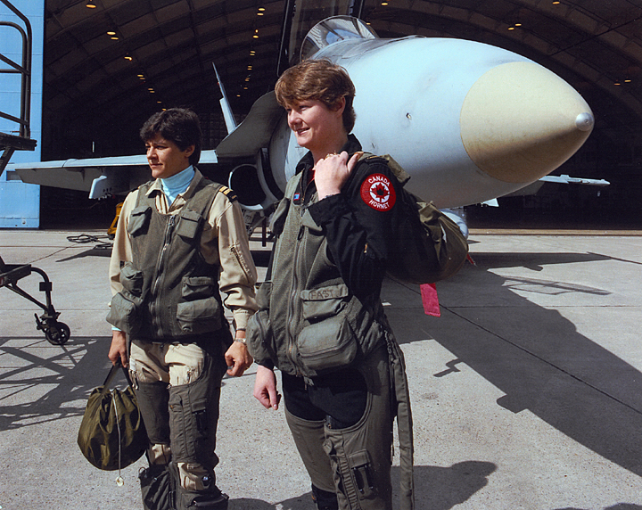 Dee Brasseur and Jane Foster with a CF-18 Hornet fighter aircraft