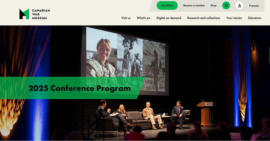 A group of people sitting on a stage