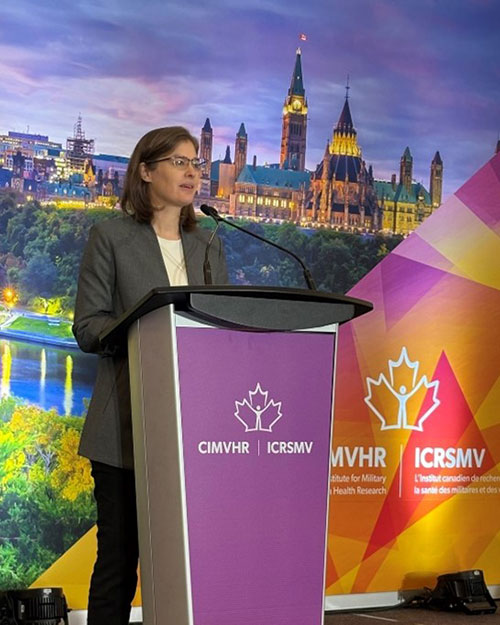 Doctor Andrea Jones delivering a speech.