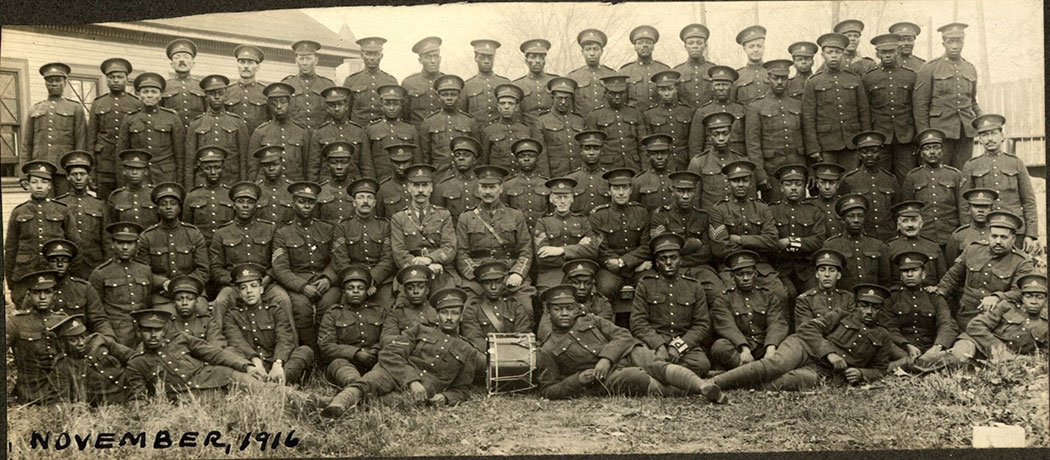 Group photograph of members of Canada’s No. 2 Construction Battalion in military uniform, taken in November 1916.