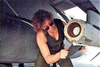 Maria Vidotto attaching the rear fins on an AIM-7 missile at Doha Airfield