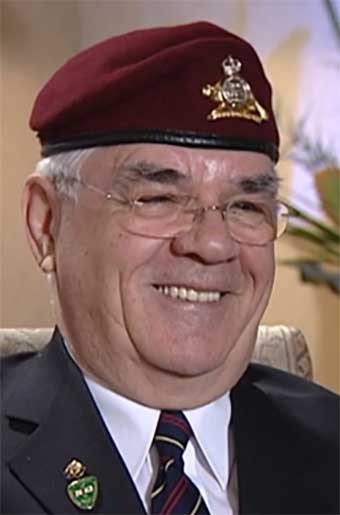 A person wearing a hat and glasses