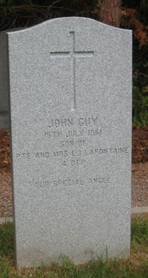 Headstone of John Guy Lafontaine.